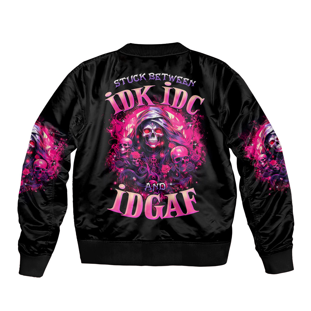 Black bomber jacket with skull graphic on back, ribbed collar and cuffs