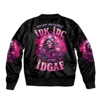 Black bomber jacket with skull graphic on back, ribbed collar and cuffs