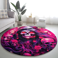 Round skull rug with glowing pink details and dark purple ribbon artwork