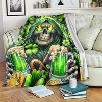 Green skull and clover beer bottles themed blanket, folded over couch backrest