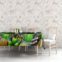 Green and black skull tablecloth with shamrock and coin artwork, draped on bench table