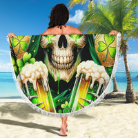 Round green skull beach blanket with shamrock emblems, fringed circular edge