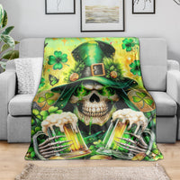 Green skull throw blanket featuring clover shamrock hat and beer-glass designs