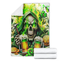 Folded Irish skull blanket with green hooded skull, beer mugs, and clover accents