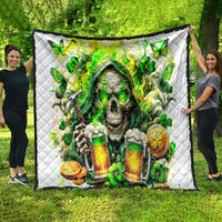 Irish-themed skull quilt spread outdoors, featuring green shamrocks and a hooded skeleton holding beers.