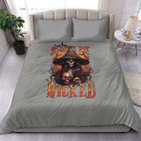 Gray duvet cover bedding set with witch skull and red orange graphic, two pillowcases