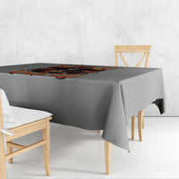 Gray tablecloth with orange witch skull Halloween graphic, corner placement