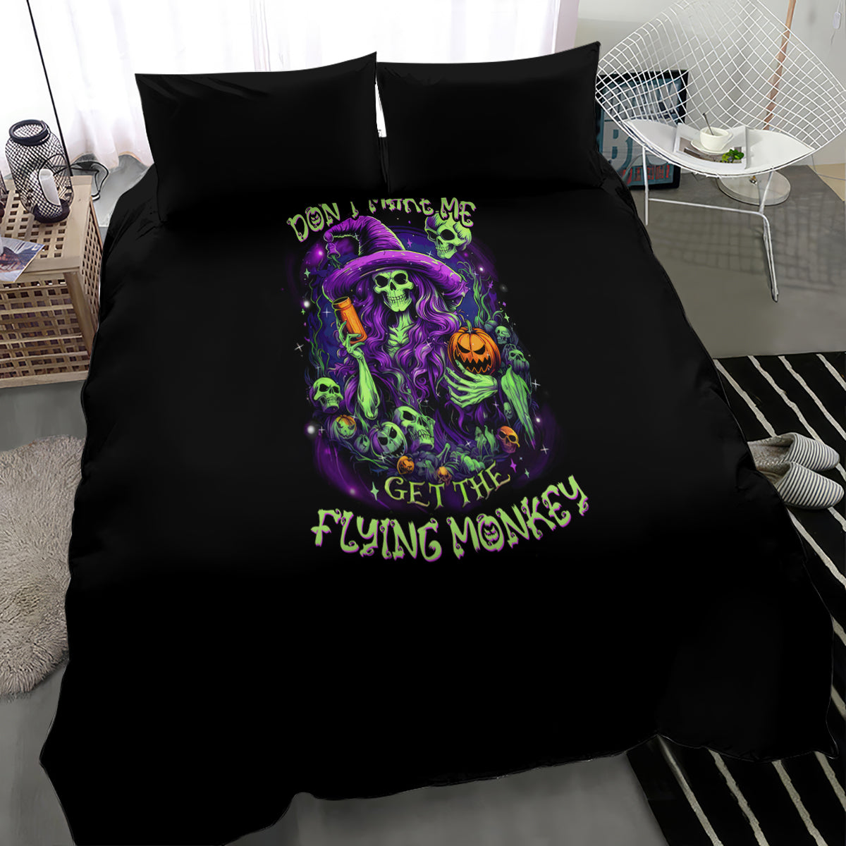 Black bedding set with large central witch skull artwork and neon green text