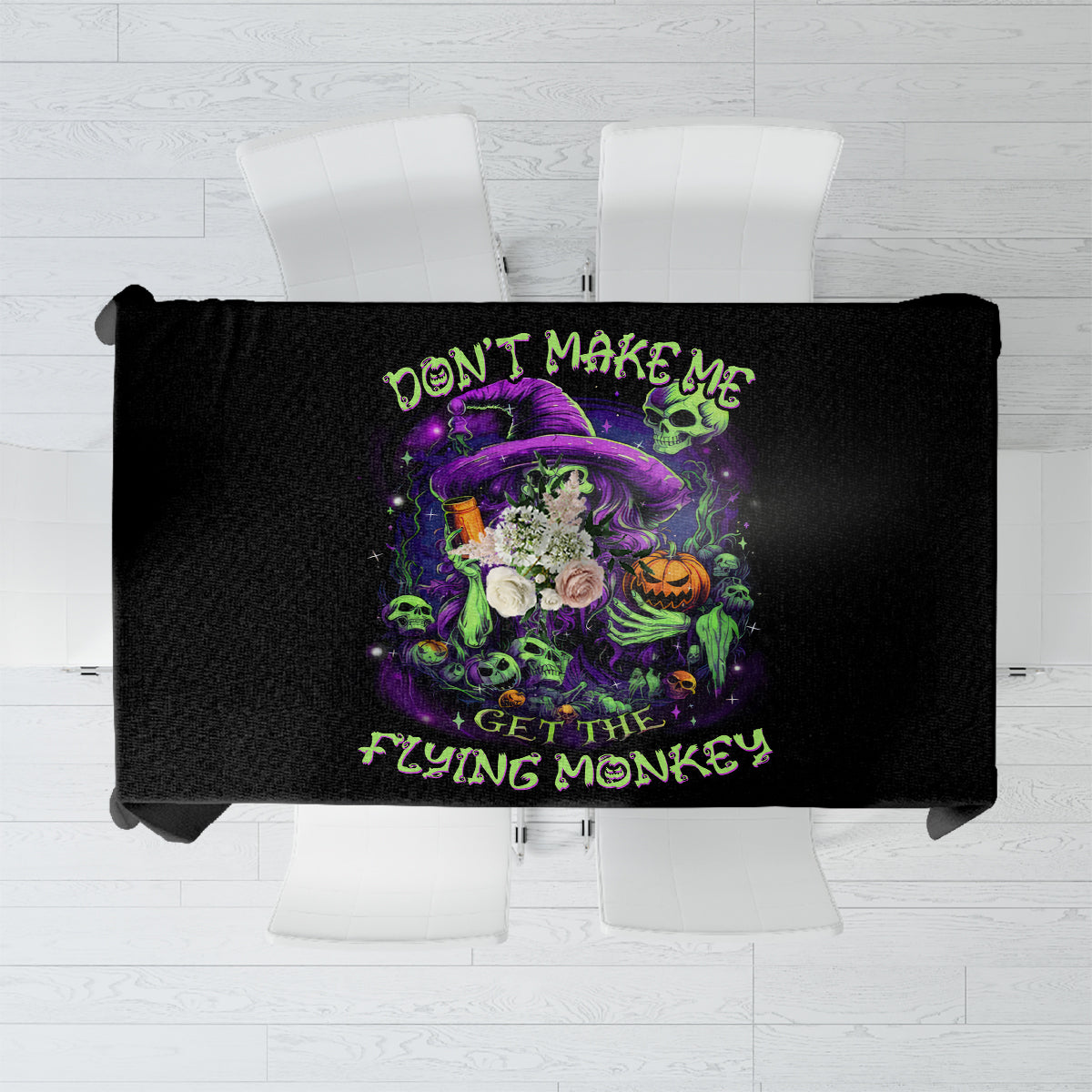 Black Halloween tablecloth with purple skull graphic and neon green message