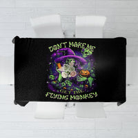 Black Halloween tablecloth with purple skull graphic and neon green message