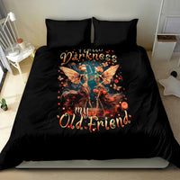 Black comforter set with winged skeleton graphic and orange teal “Darkness” lettering