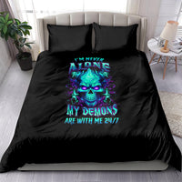 Black bedding set with blue neon skull graphic and text on duvet and matching pillows