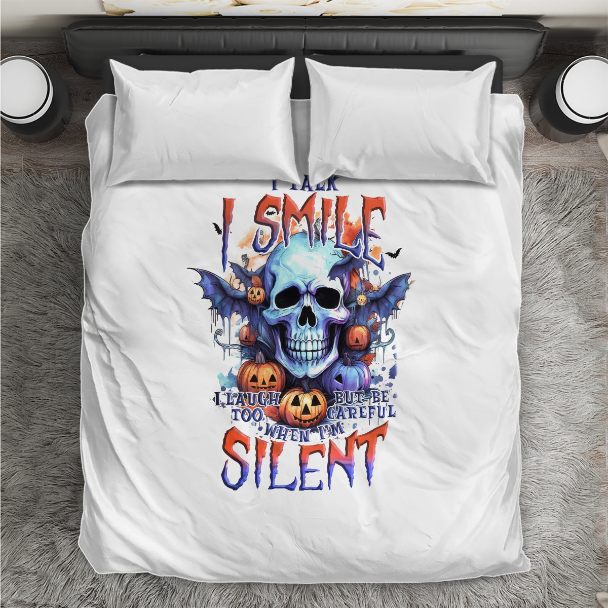 White bedding set with blue skull SMILE lettering on duvet and pillowcases