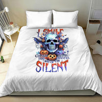 White bedding set with blue skull and SILENT text on duvet and two pillowcases