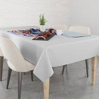 White tablecloth with colorful bat skull graphic center panel and draped edges