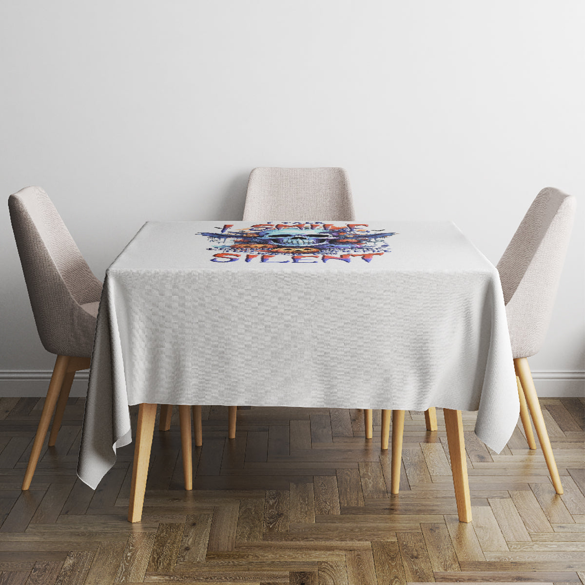 White tablecloth with colorful bat skull graphic centered on the tabletop