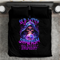 Black duvet set with centered purple witch skull graphic and two pillow covers