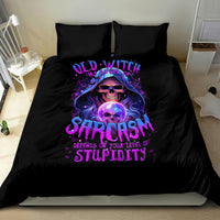 Black bedding set with large purple witch skull artwork on the duvet and two pillows