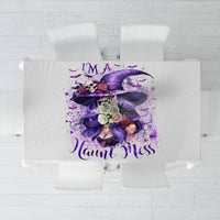 White tablecloth with purple witch skull and I'm A Haunt Mess slogan, top view