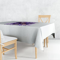 White tablecloth with purple witch skull and I'm A Haunt Mess print, corner view