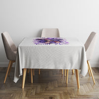 White tablecloth with purple witch skull print, middle placement on dining table