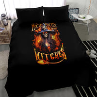 Black duvet set featuring fiery witch skull graphic and orange “Hocus Pocus” lettering