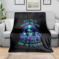 Black skull and flower lady throw blanket with teal and purple graphic and bold text
