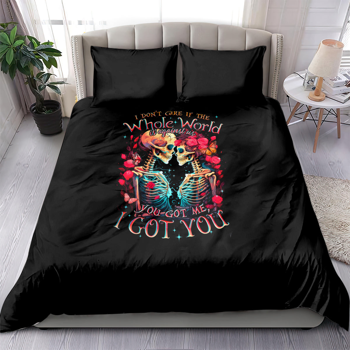 Black duvet set with skull-and-roses graphic and matching pillowcases