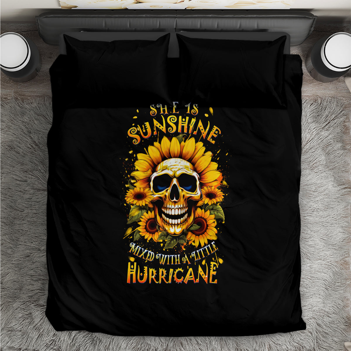 Black bedding set laid flat with sunflower skull graphic centered on duvet and pillows