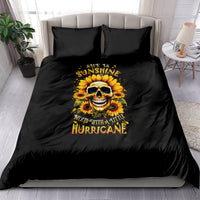 Black bedding set with sunflower skull graphic and bold text on duvet and two pillows