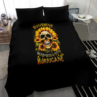 Black duvet and two pillows with sunflower skull artwork and HURRICANE text