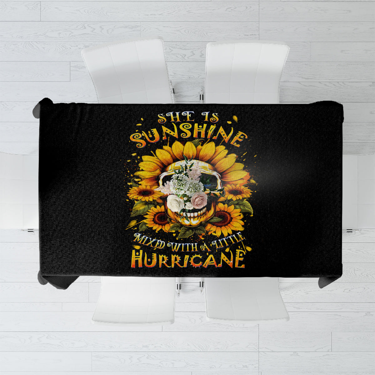 Black tablecloth with centered sunflower skull and yellow-gold lettering