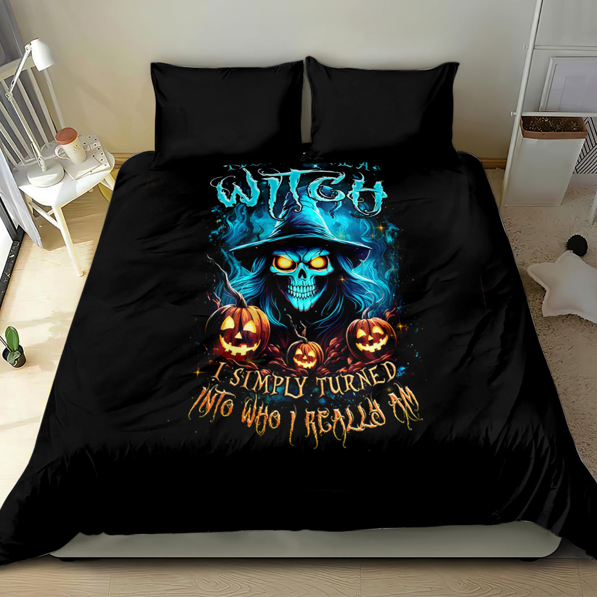 Black duvet and pillow set showing blue skull witch with pumpkins and glowing graphic