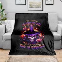 Black Halloween blanket with colorful wizard skull graphic and purple text