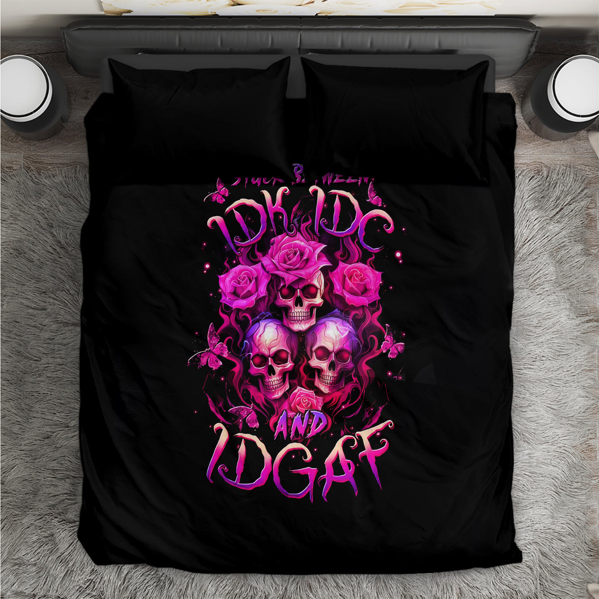 Black skull bedding set with pink roses and three-skull graphic; duvet and 2 pillowcases