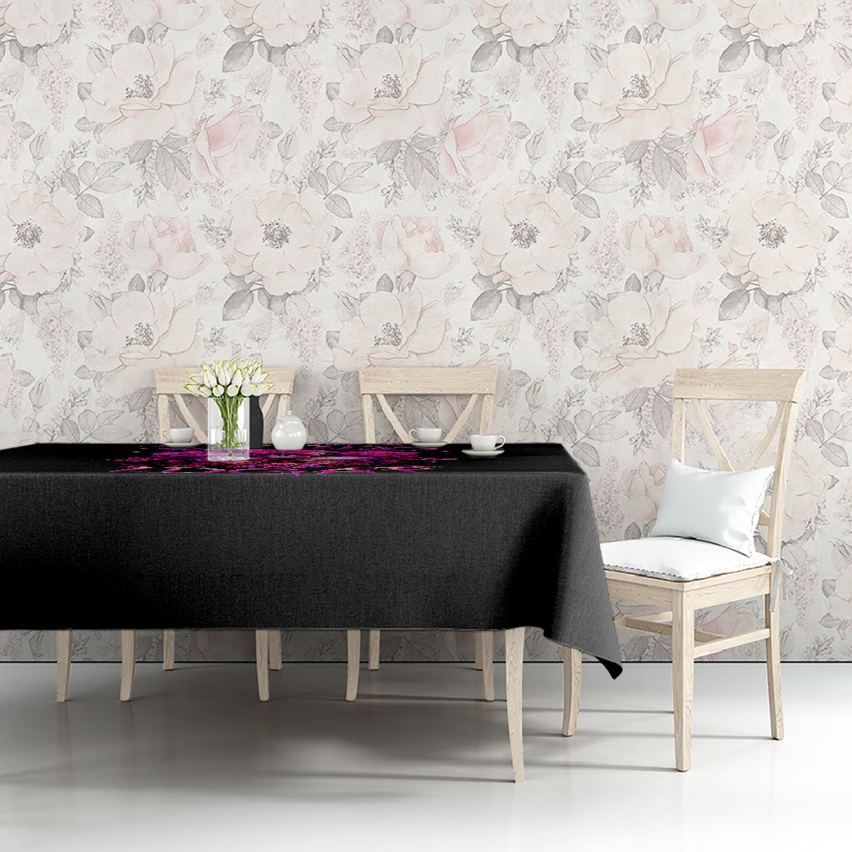 Black tablecloth with purple skull-and-roses graphic on dining table