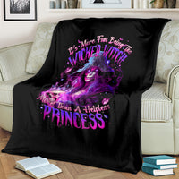 Black blanket with purple witch skull and Wicked Witch Princess graphic on couch