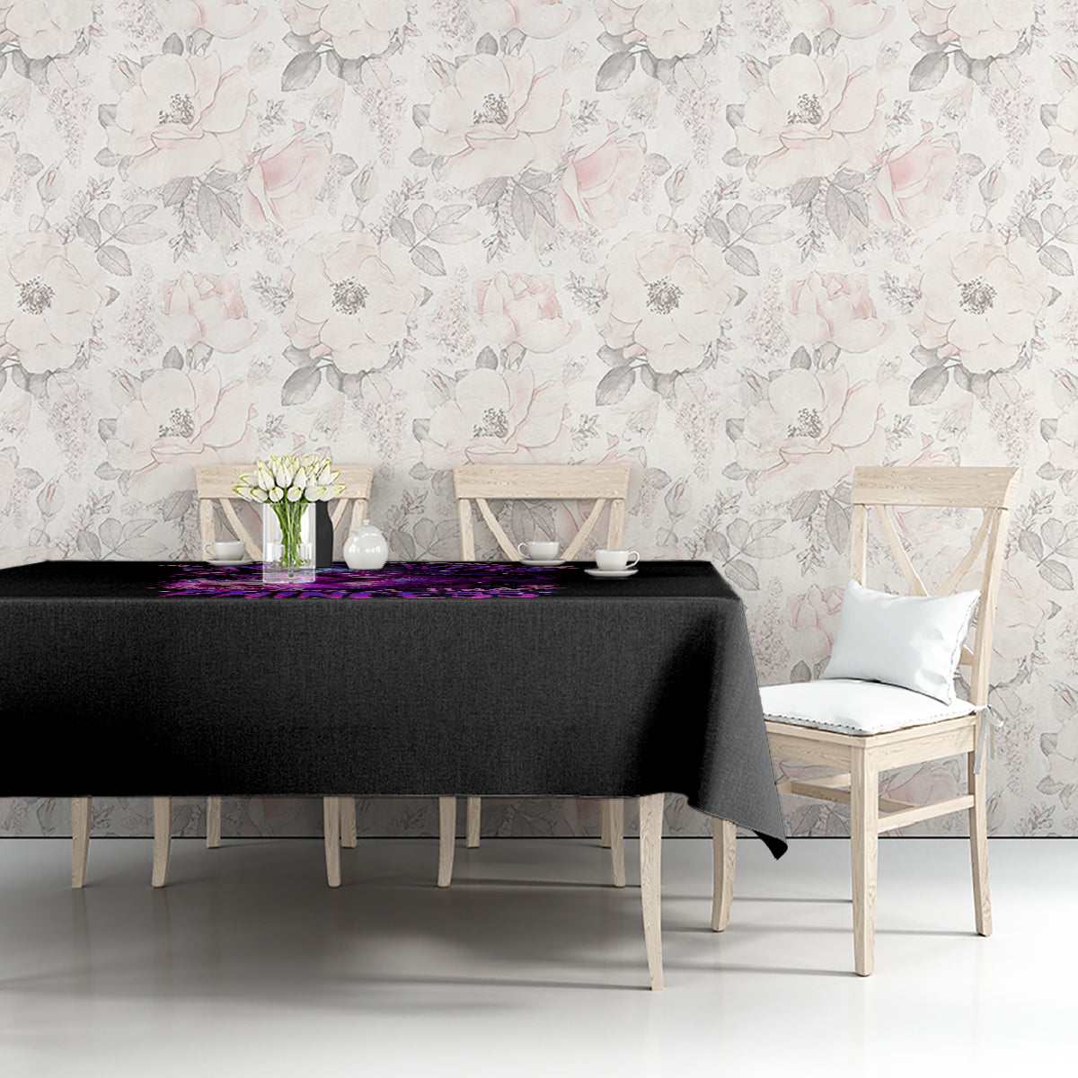 Black tablecloth with purple witch skull graphic, draped over table edge