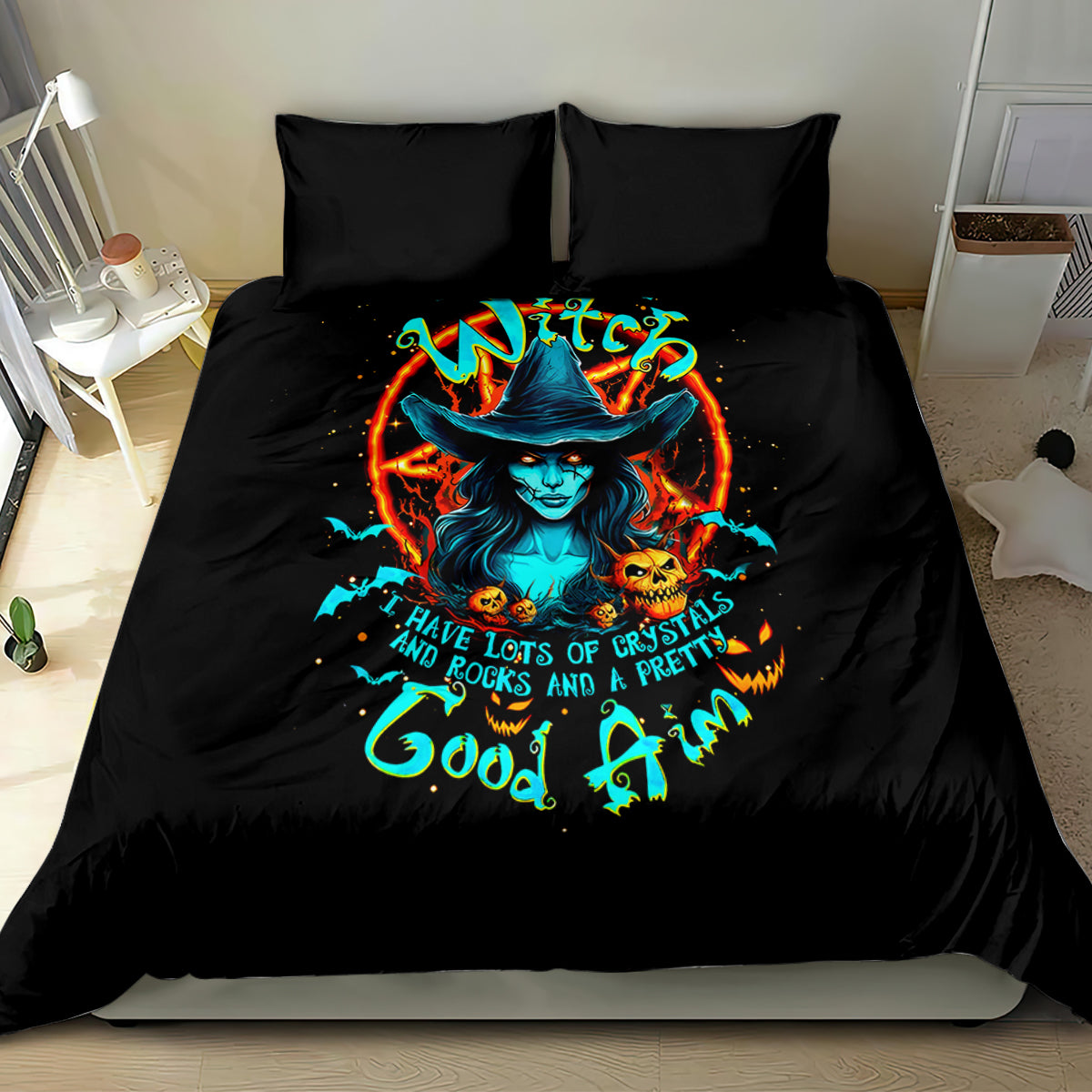 Black bedding set with two pillows and colorful witch-skull graphic on comforter