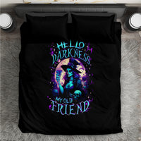 Black bedding set with centered witch and skull artwork on duvet and pillowcases