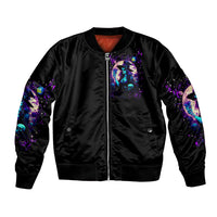 Black bomber jacket with front zip and witch skull chest graphic, ribbed hem