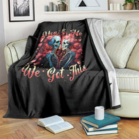 Black skull and rose blanket with "You & Me We Got This" quote, on sofa