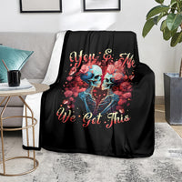 Black blanket with skulls and roses and "You & Me We Got This" lettering