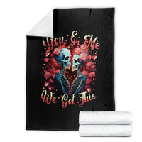Black skull and rose blanket with "You & Me We Got This" print, stacked with towels