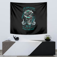 Black hanging tapestry with teal skull and rose graphic, centered on wall