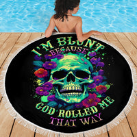 Black circular beach blanket with fringe, neon skull graphic centered