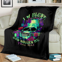 Black skull and flower print blanket draped on a sofa, multicolor text graphic.