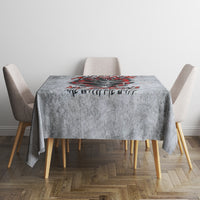Grey devil skull tablecloth with red flame skull motif on square dining table