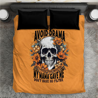 Orange bedding set with skull and flower print on duvet, black pillowcases