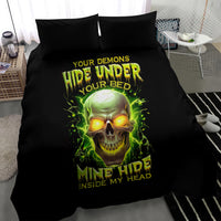 Black bedding set with glowing green skull print on duvet and two black pillows